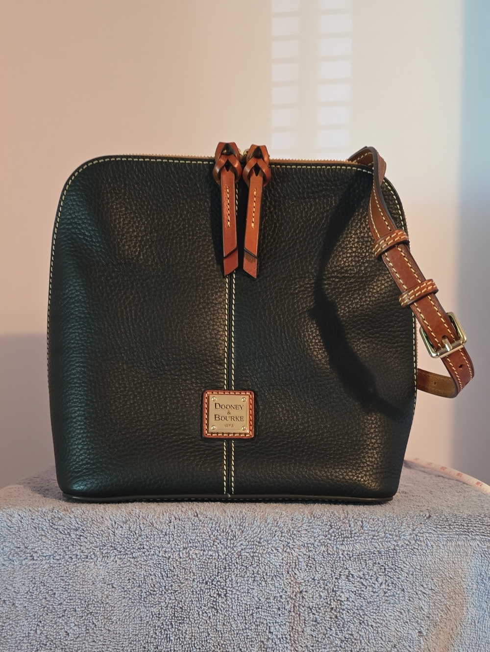 Dooney & Bourke Black Zip/Zip Pebbled Leather Crossbody with Tan Trim